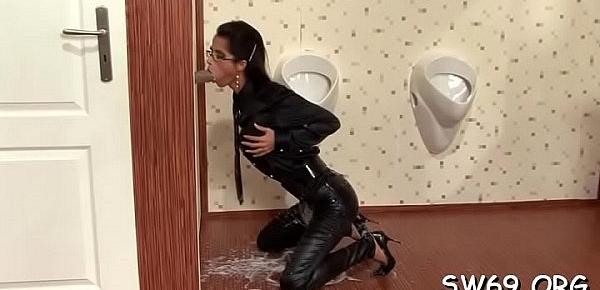  Agreeable playgirl enjoys at gloryhole and gets covered in slime